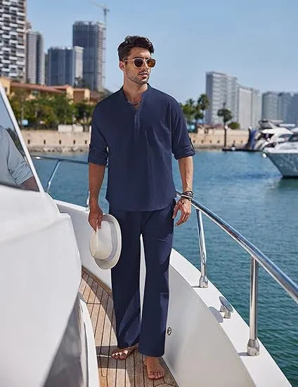 Men's solid colour cotton casual suit with long sleeves and trousers on a hanger.