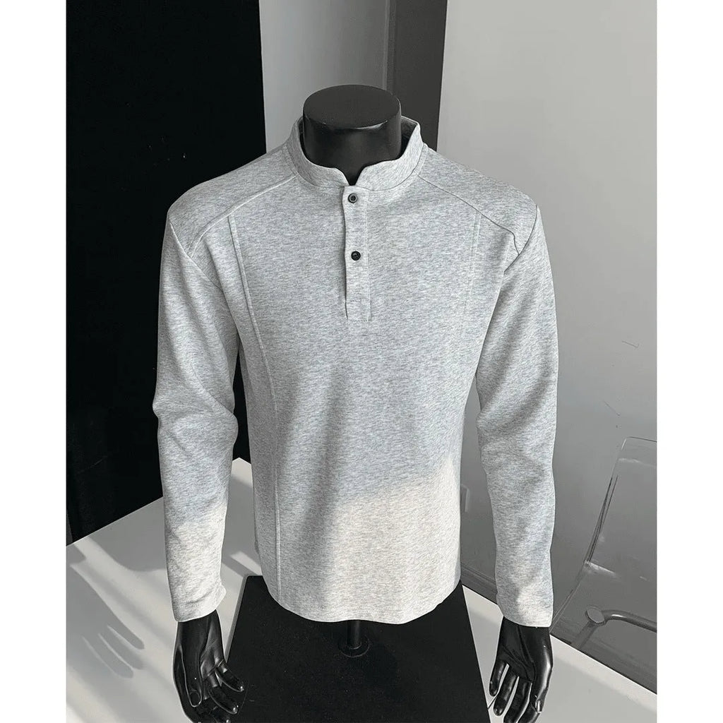 Men's patchwork stand-up collar sweater in black with asymmetric shoulder and long sleeves, loose fit