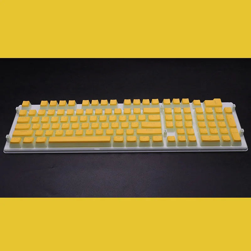 Set of 108 translucent pudding-style PBT keycaps for mechanical keyboards in assorted colours.