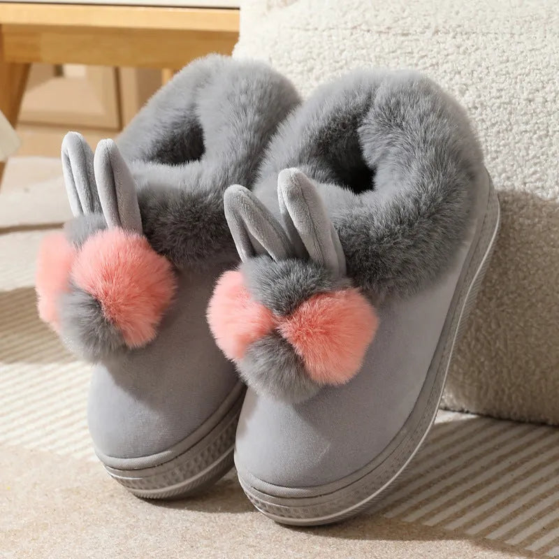Black thick-soled high heel winter slipper with plush upper and textured TPR sole.