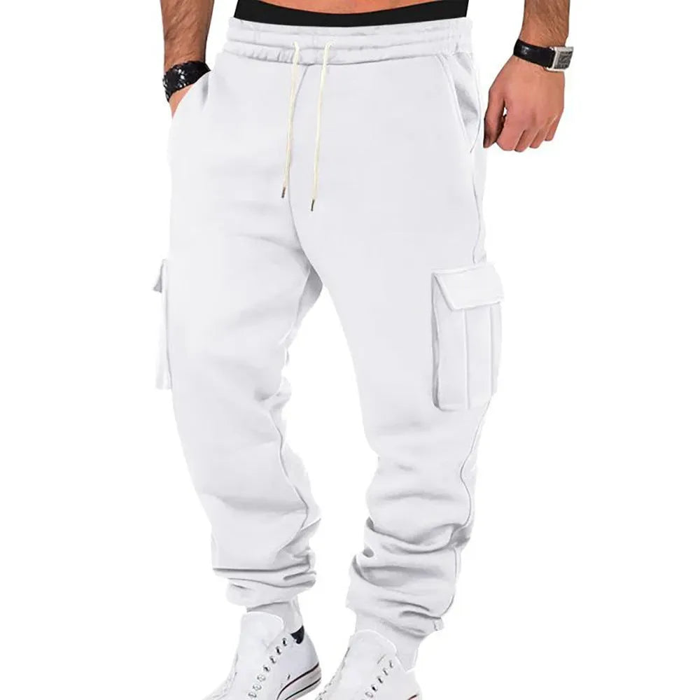 Men's solid colour casual multi-pocket drawstring sports pants in black, featuring polyester fabric and mid-waist design