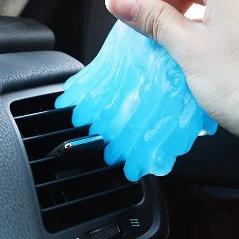 Blue and yellow blocks of magic cleaning gel adhesive putty for dust removal, 160g size.