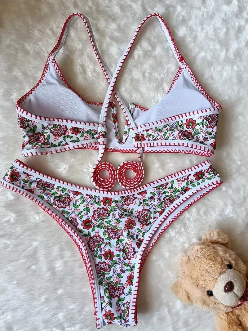 Women's floral print V-neck swimsuit with embroidery in blue and green colours