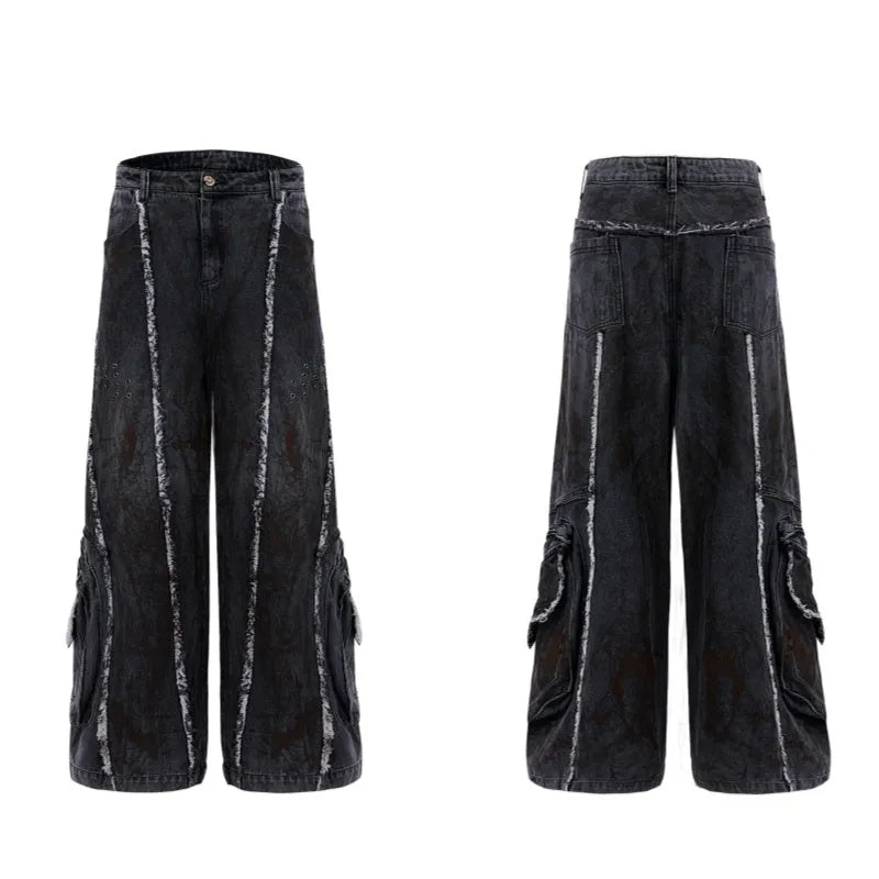 Black distressed denim coat and pants set with a gradient pattern and padded shoulders.