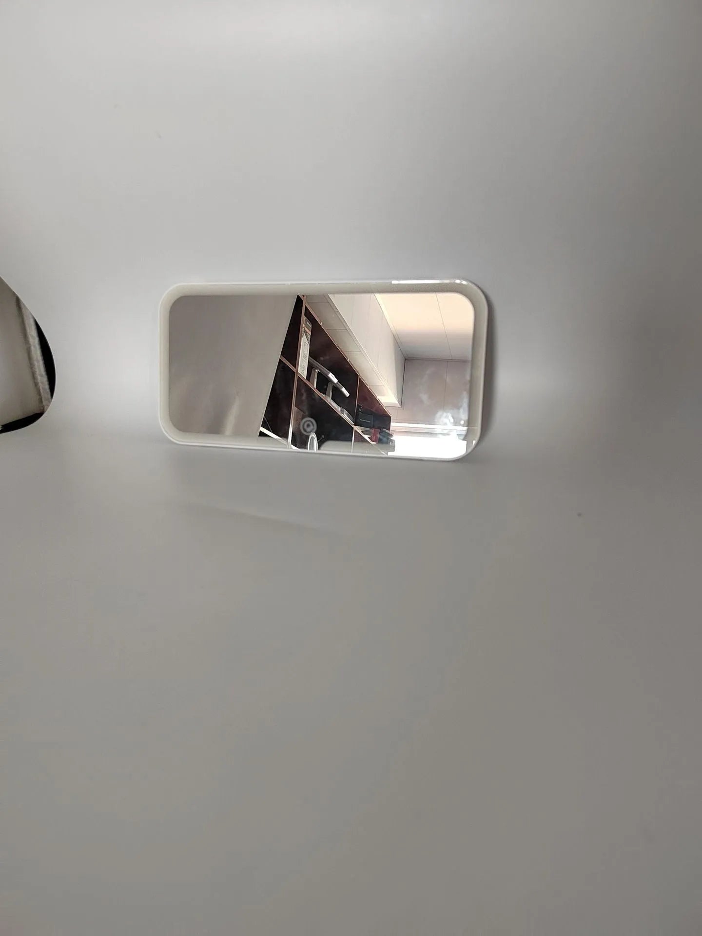 White ABS plastic car sun visor with LED light and aluminium makeup mirror.