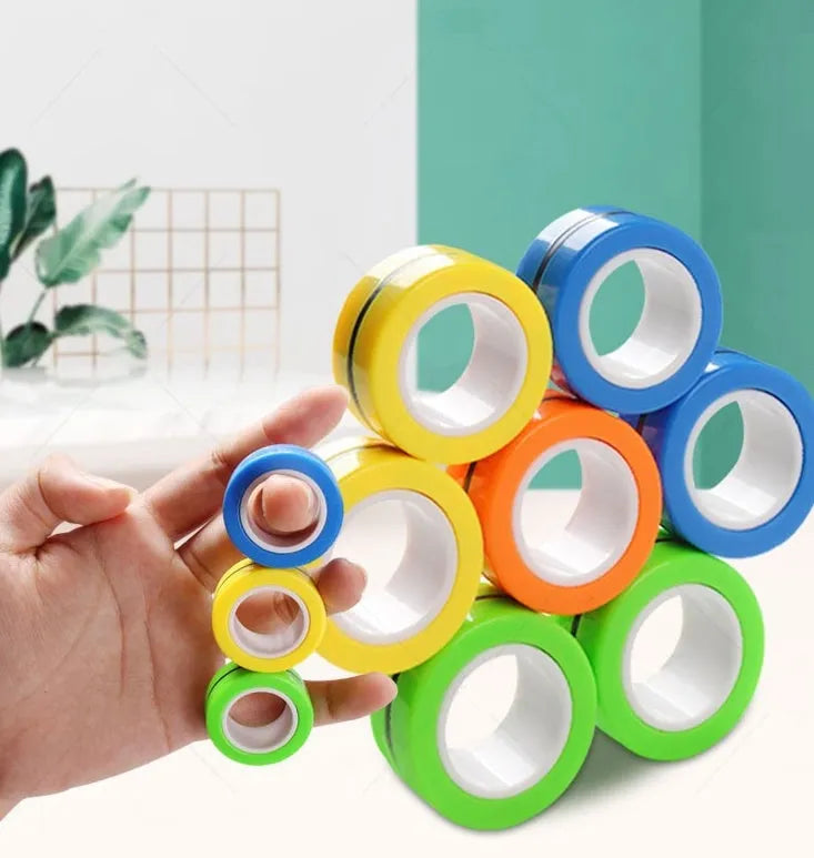 Blue magnetic plastic rotating fidget ring showing internal diameter of 1.8cm.