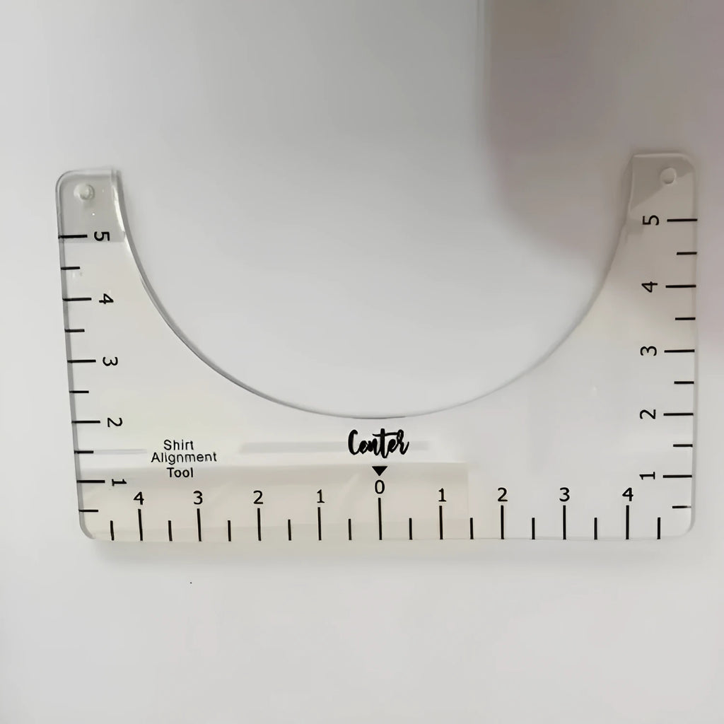Transparent acrylic sewing patch ruler measuring 10x6 inches for T-shirt alignment and garment construction