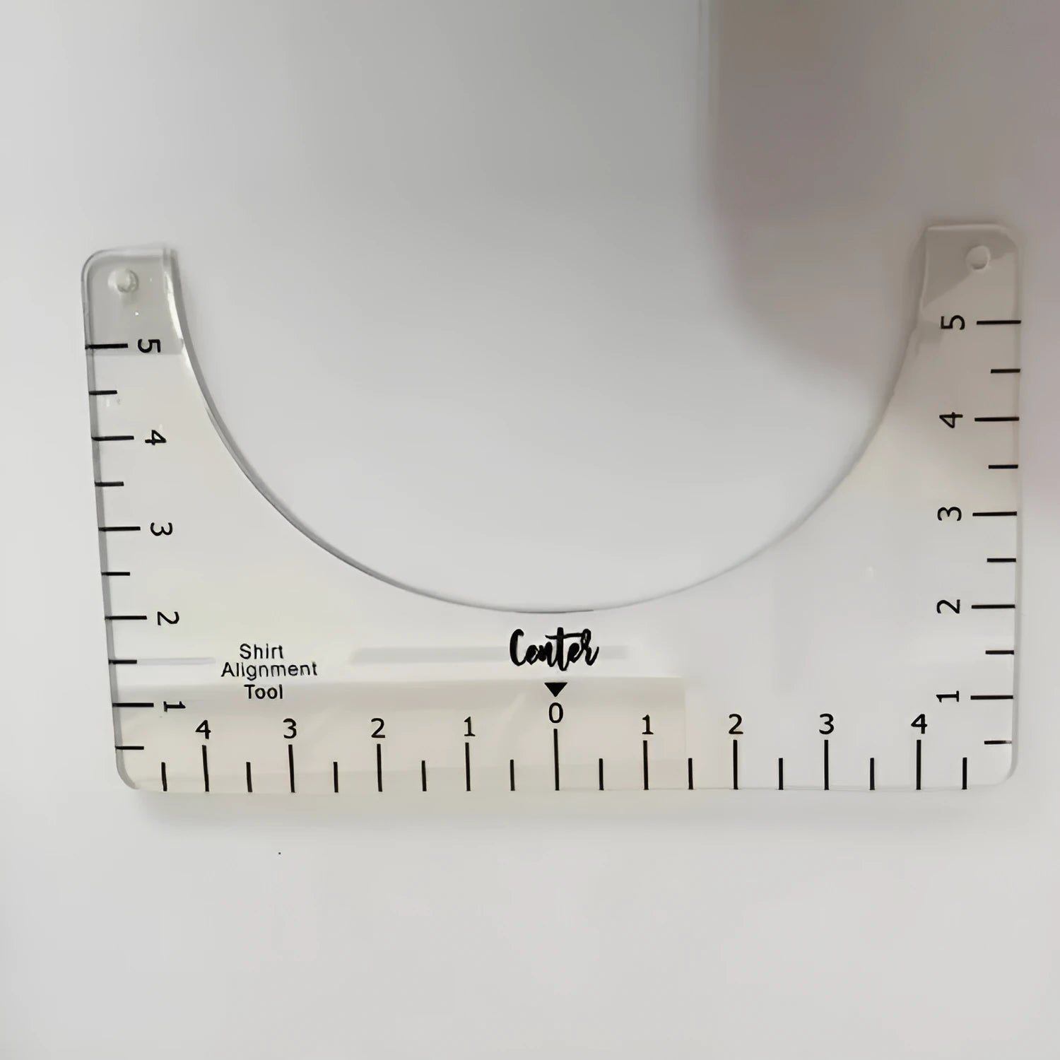 Transparent acrylic sewing patch ruler measuring 10x6 inches for T-shirt alignment and garment construction