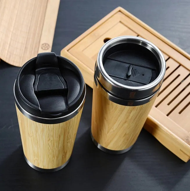 Bamboo coffee cup with thermal insulation, leak-proof lid, and anti-slip foam pad base showing 420ml capacity