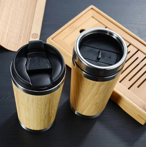 Bamboo coffee cup with thermal insulation, leak-proof lid, and anti-slip foam pad base showing 420ml capacity