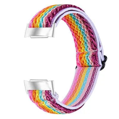 Printed elastic replacement watch strap compatible with Fitbit Charge 6, shown in an adjustable length.