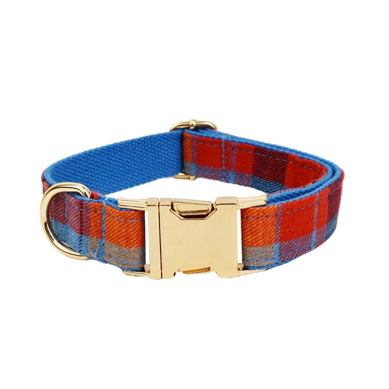 Four-piece dog fashion set showing collar, leash, bow tie and vest in coordinated cloth material