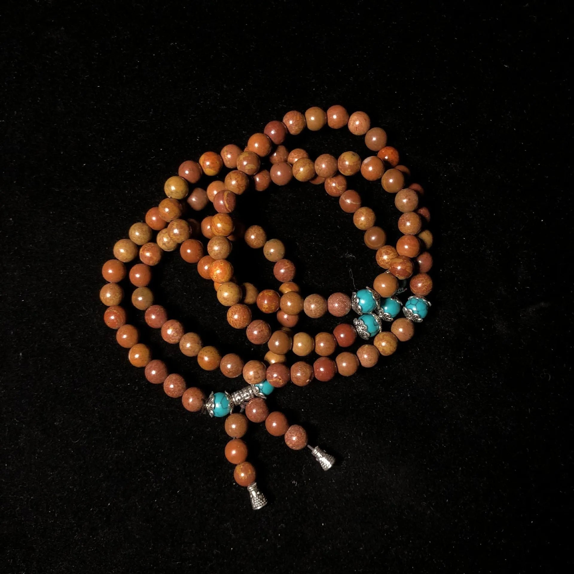 108 bead natural stone bracelet with hand-polished geometric lvzhu beads measuring 5-6mm diameter