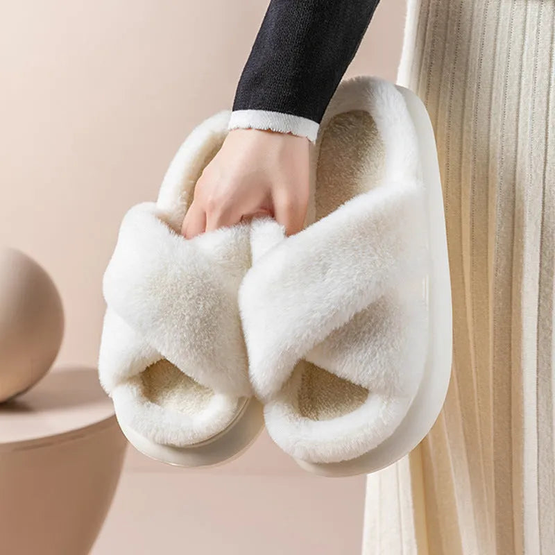 Women's platform fuzzy suede open toe criss-cross house slippers in Khaki on a wooden floor