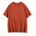 Loose fit men's cotton t-shirt with round neck and drop-shoulder sleeves in solid colour