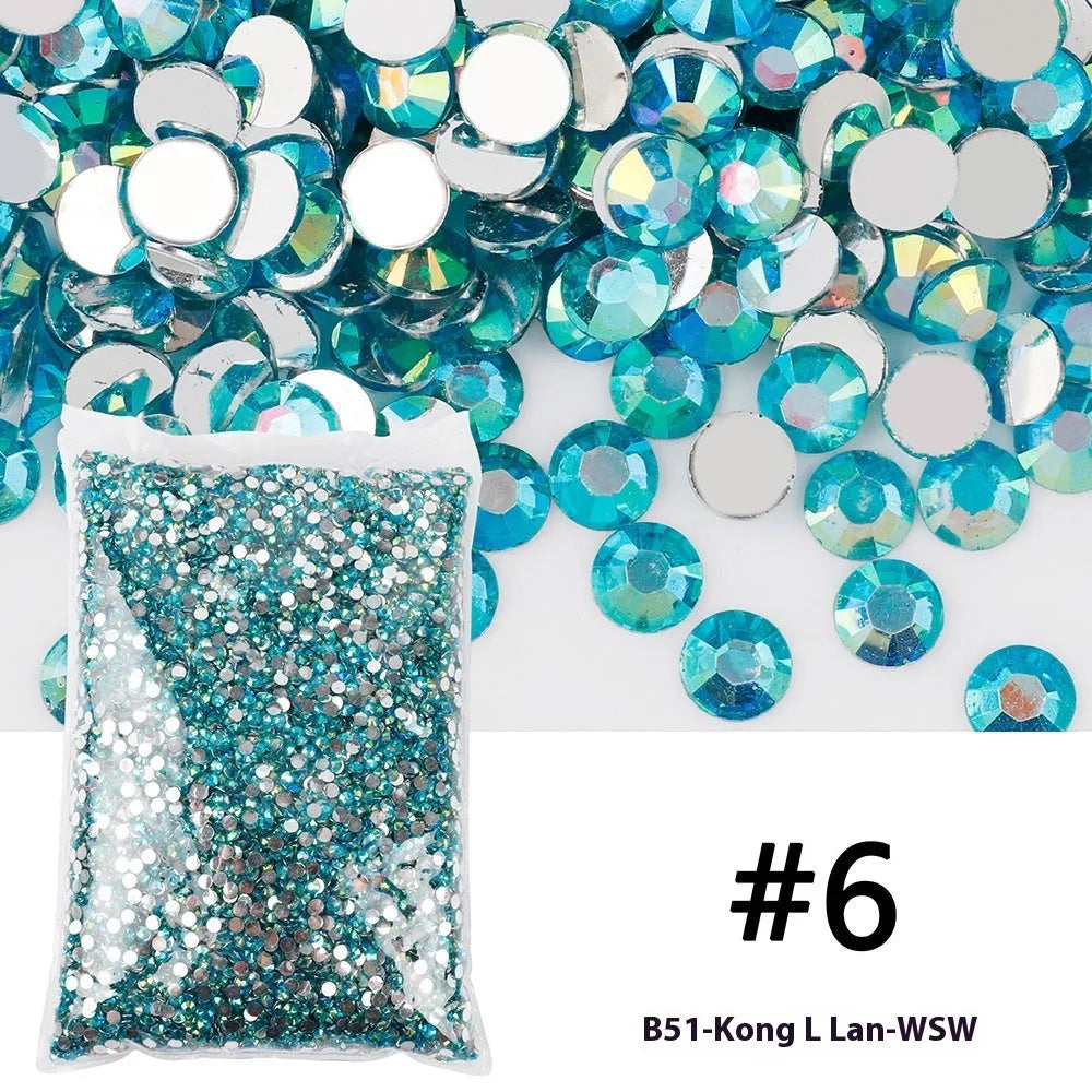 Plastic resin nail art rhinestones in multiple colours with electroplated surfaces arranged in mesh packaging