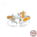 Silver cartoon corgi ring with naughty expression on women's finger SCR1014-E