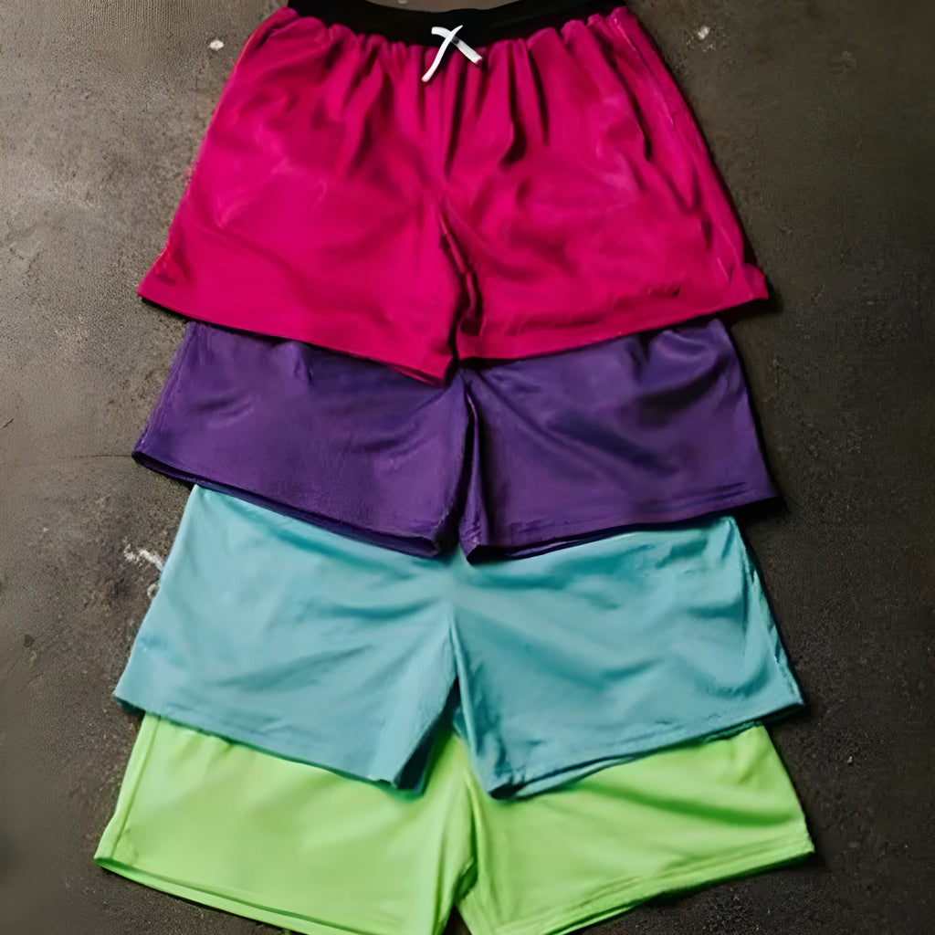 Man wearing black mesh quick-drying shorts for running or fitness training.