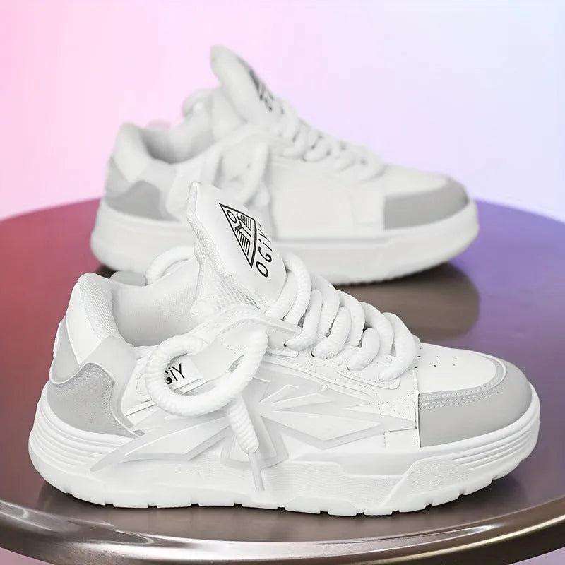 Men's white clunky casual sneakers with cartoon totem pattern, round toe, and lace-up front on a rubber sole.