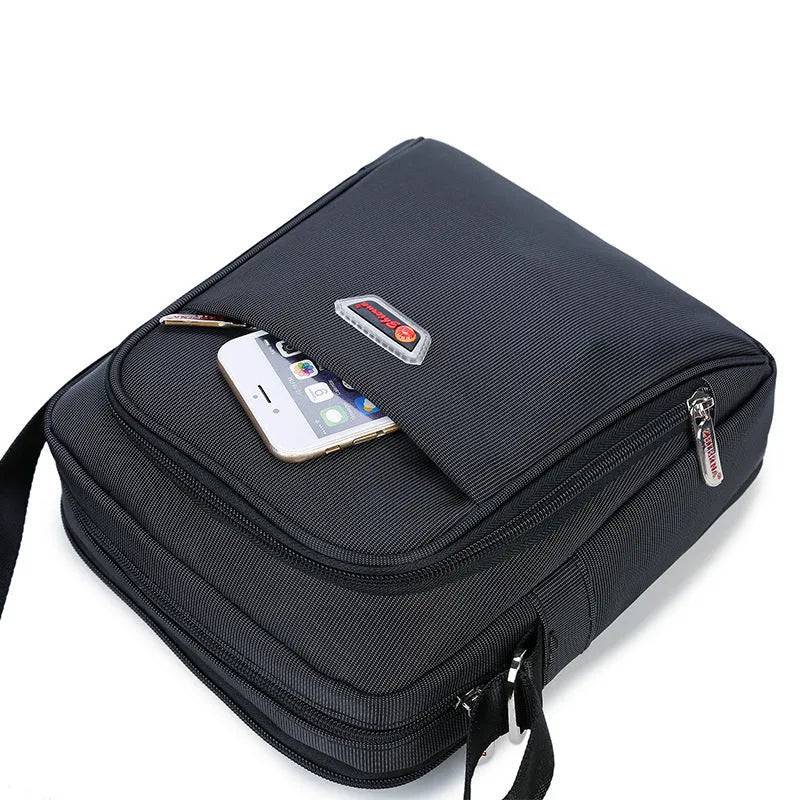 Men's black Oxford cloth messenger bag with zipper closure, single shoulder strap, and printed car-suture outer pocket