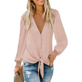 Women's apricot V-neck loose top with long sleeves and a lace-up detail on the hem.