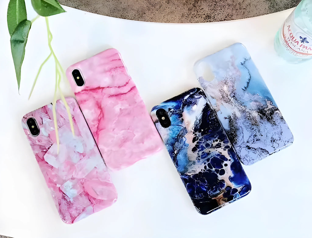 Colourful stone pattern soft back cover case for iPhone on a table.