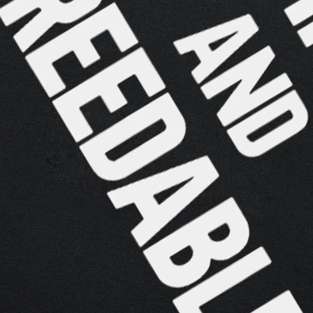 A loose fit men's cotton t-shirt with a short sleeve and a printed humour design, shown in a black colour variant.