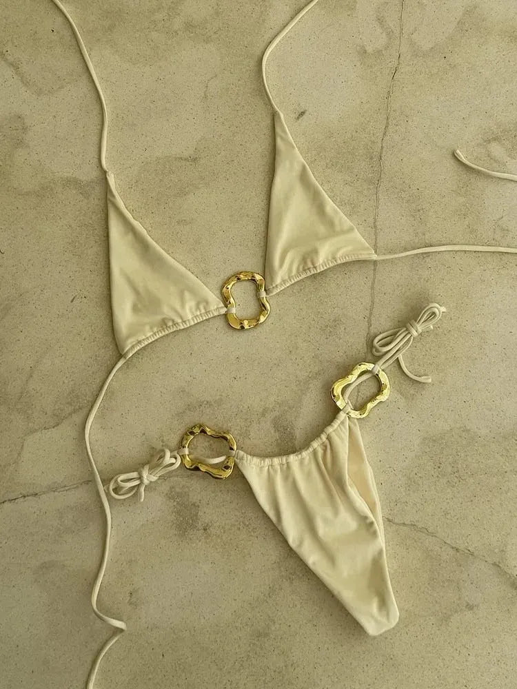 Women's halter neck bikini top and low-waist lace-up print briefs in solid colour
