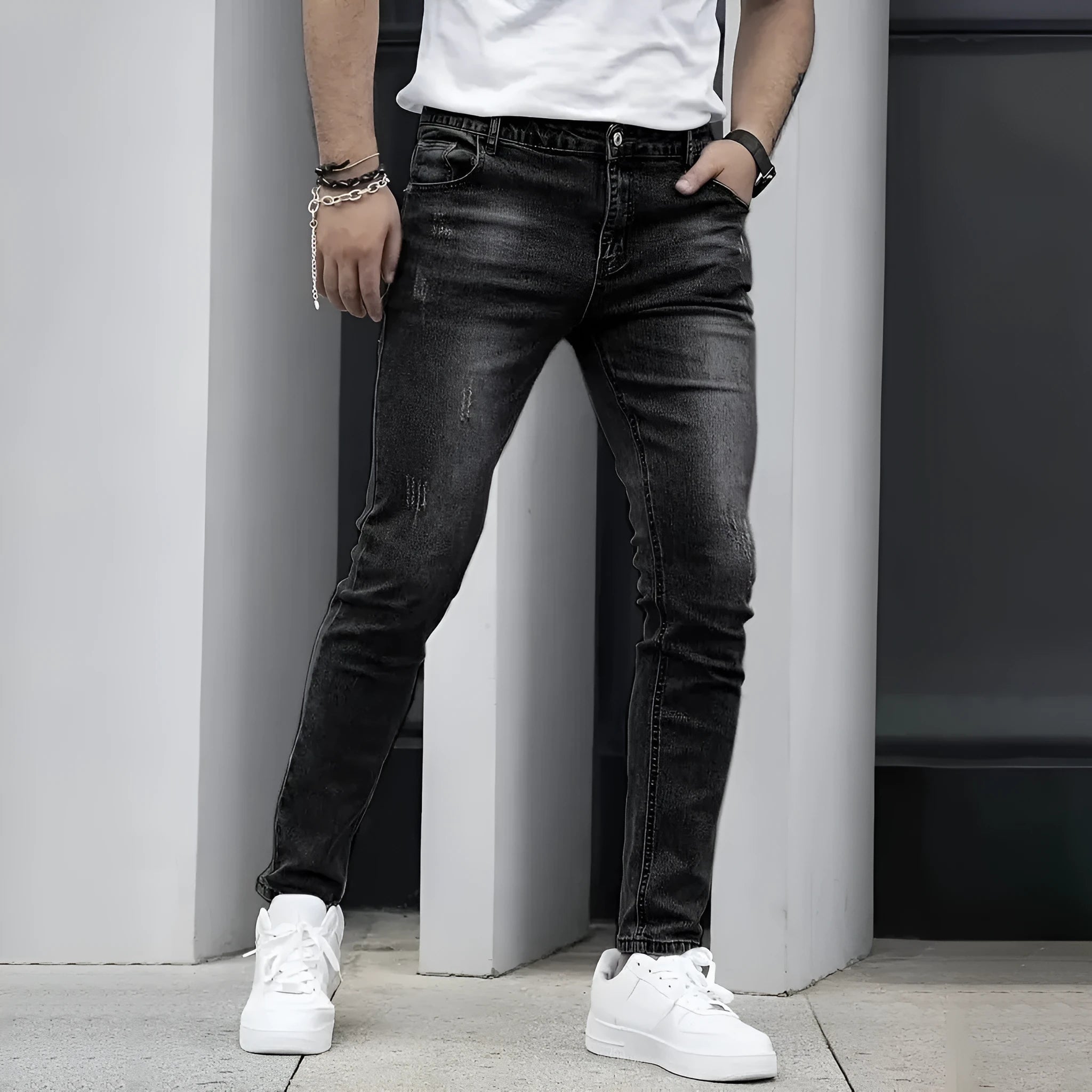 Men's straight leg jeans in stretch cotton denim showing high elasticity fabric and slim silhouette