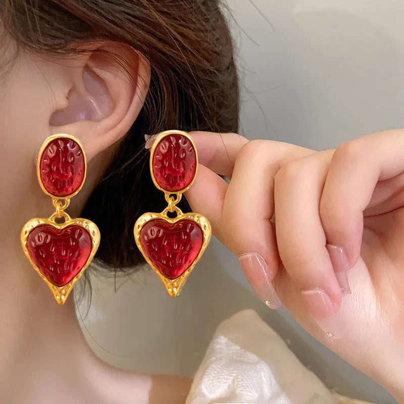 Pleated oval love heart stud earrings in purple, red, green, and yellow white colours with butterfly backs