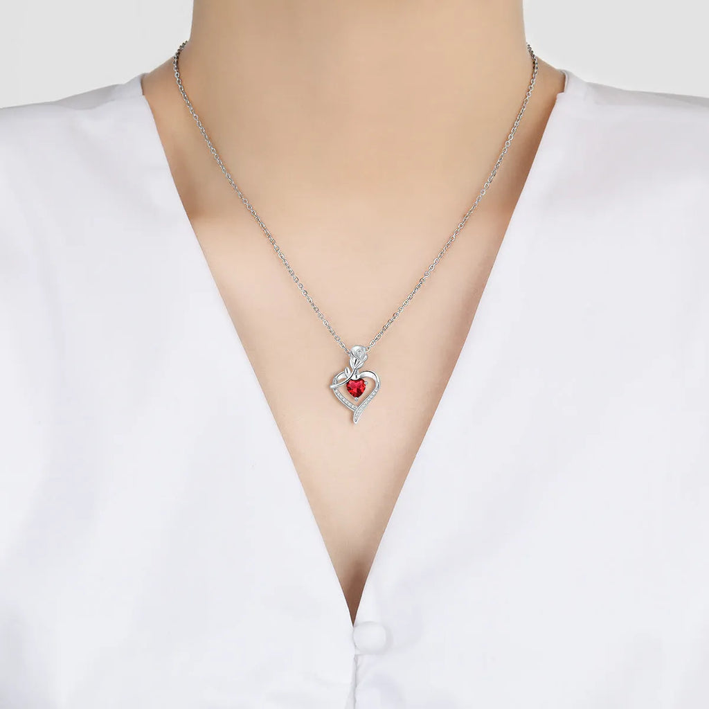 Rose heart-shaped necklace with rhinestones in copper electroplated finish, available in blue, purple, red, or white