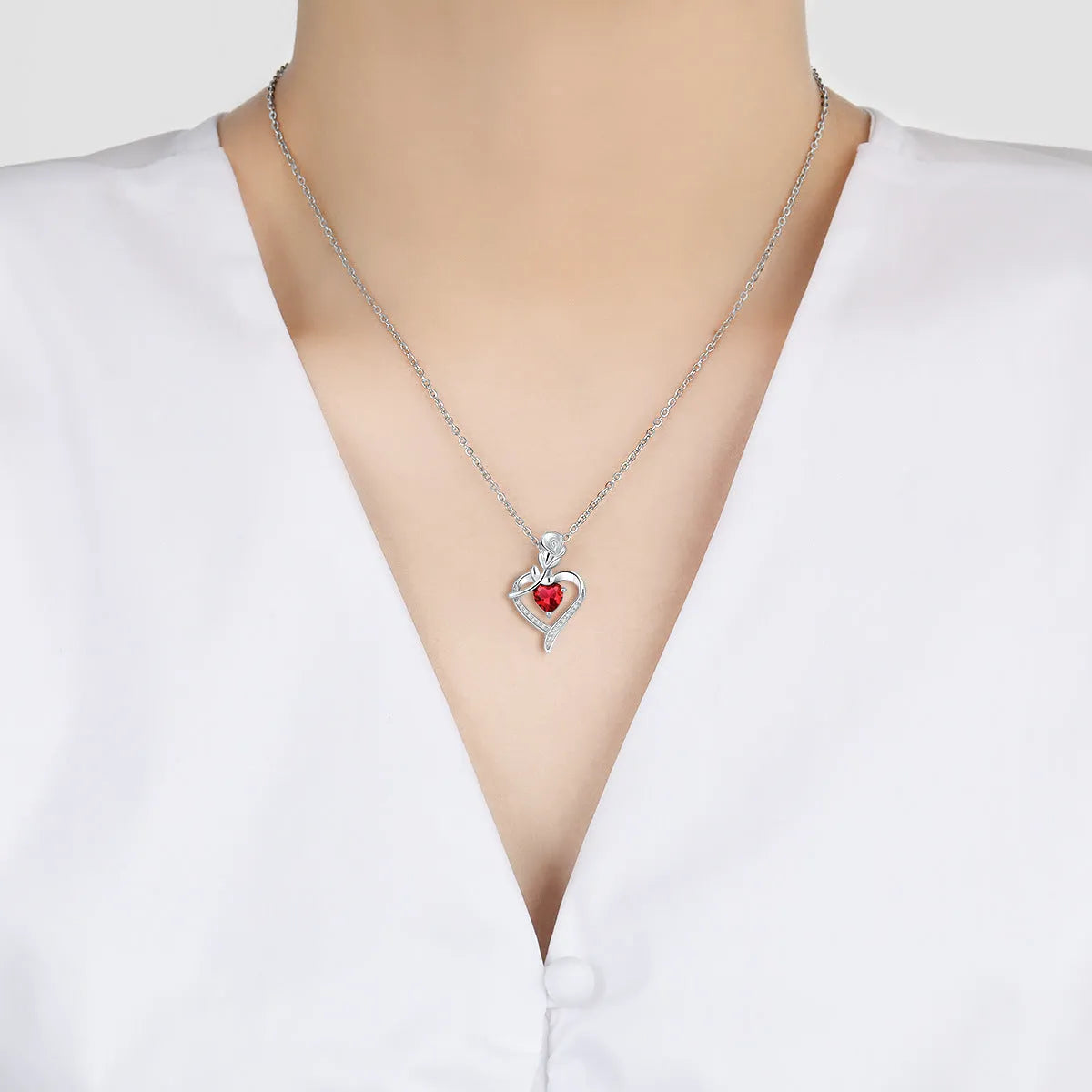 Rose heart-shaped necklace with rhinestones in copper electroplated finish, available in blue, purple, red, or white