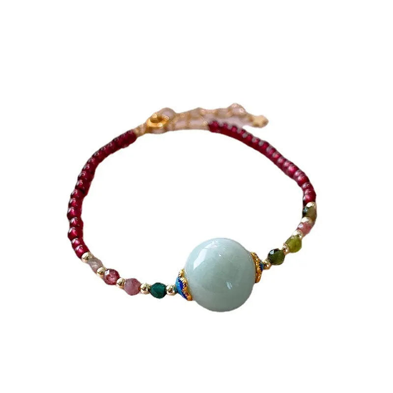 Aquamarine colour tourmaline bracelet with drop shape gemstones and Korean-style design