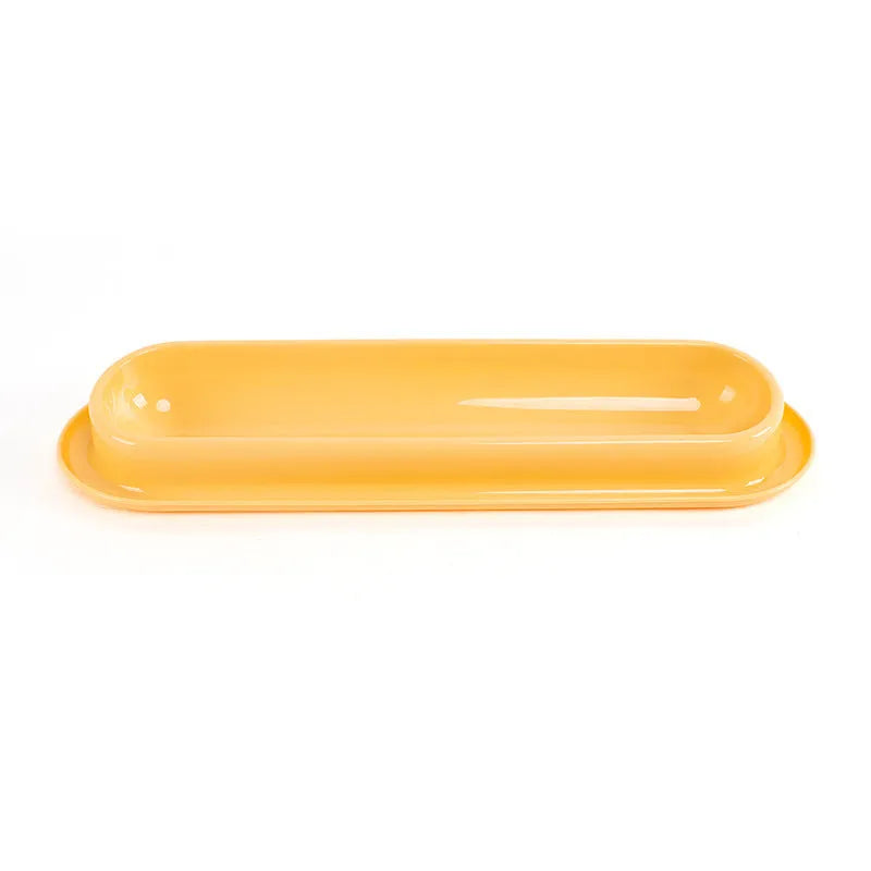 Green dual-compartment pet bowl with removable stainless steel insert and non-slip silicone base