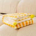 Blue coral fleece pet blanket shown laid out flat, demonstrating its soft texture and size.