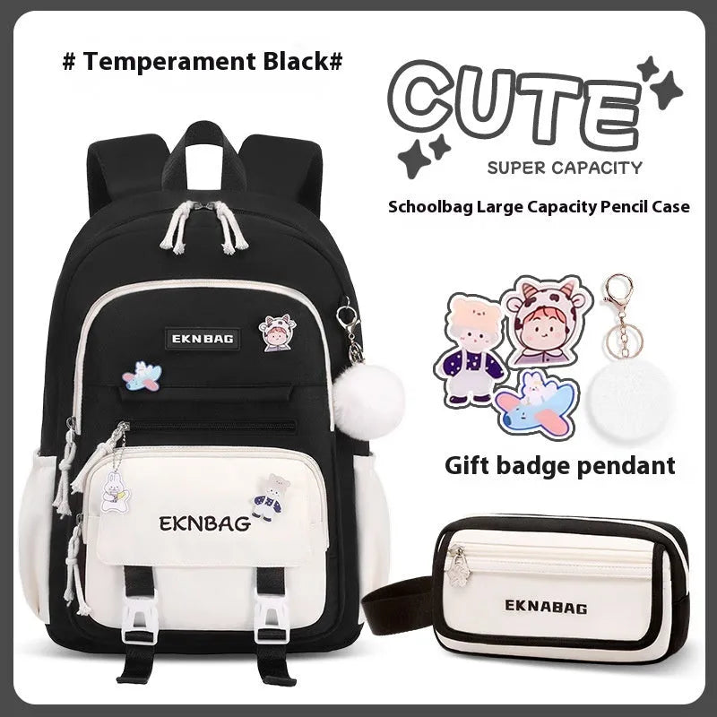 Girls' pink waterproof Oxford cloth school backpack with curved shoulder straps.