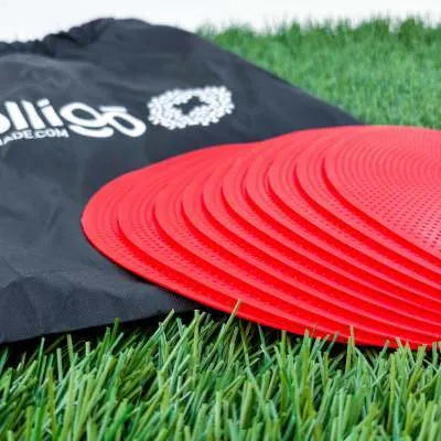 23cm diameter football training landmark pad in bright colours on grass field