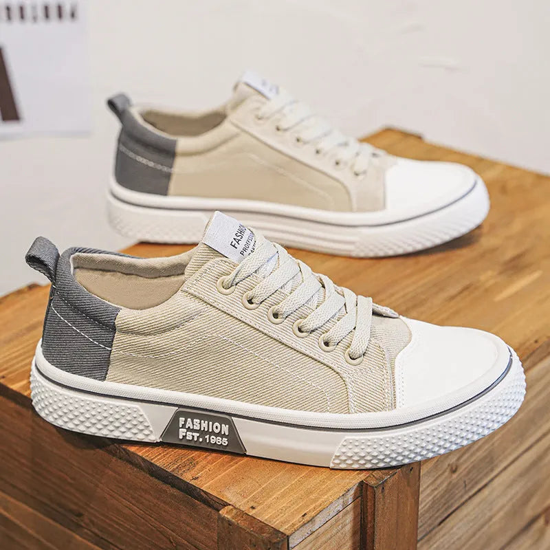 Men's blue canvas casual skateboarding shoes with round toe and lace-up front