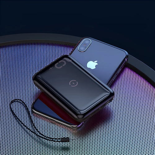 Small square wireless fast charge power bank with digital display showing battery percentage