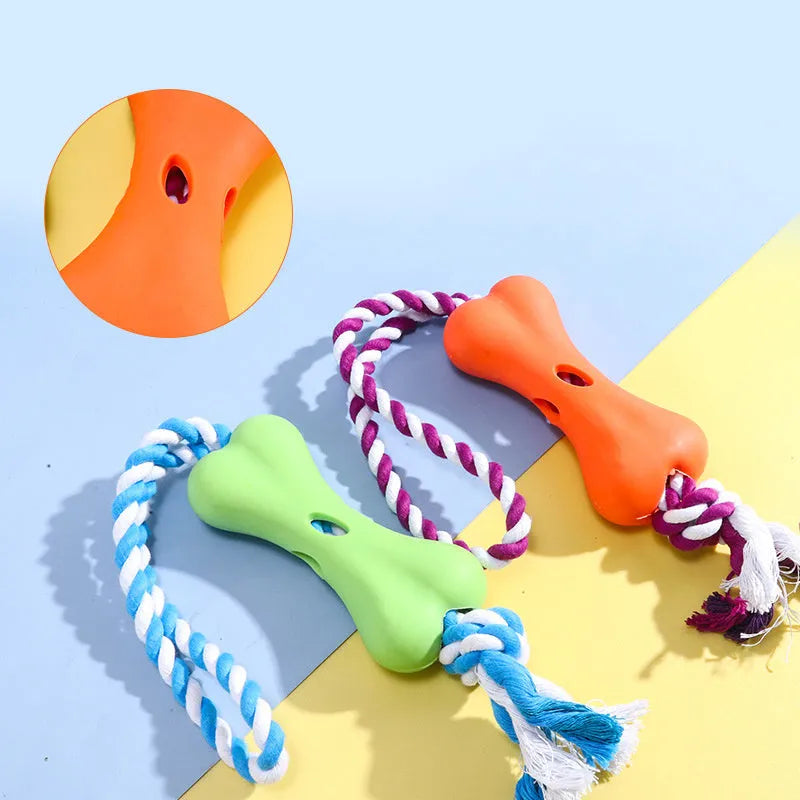 Green porous bone-shaped dog toy with rope knot texture and slots for beef strips or cheese treats
