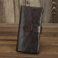 Genuine leather women's wallet in black showing vertical style with multiple card slots