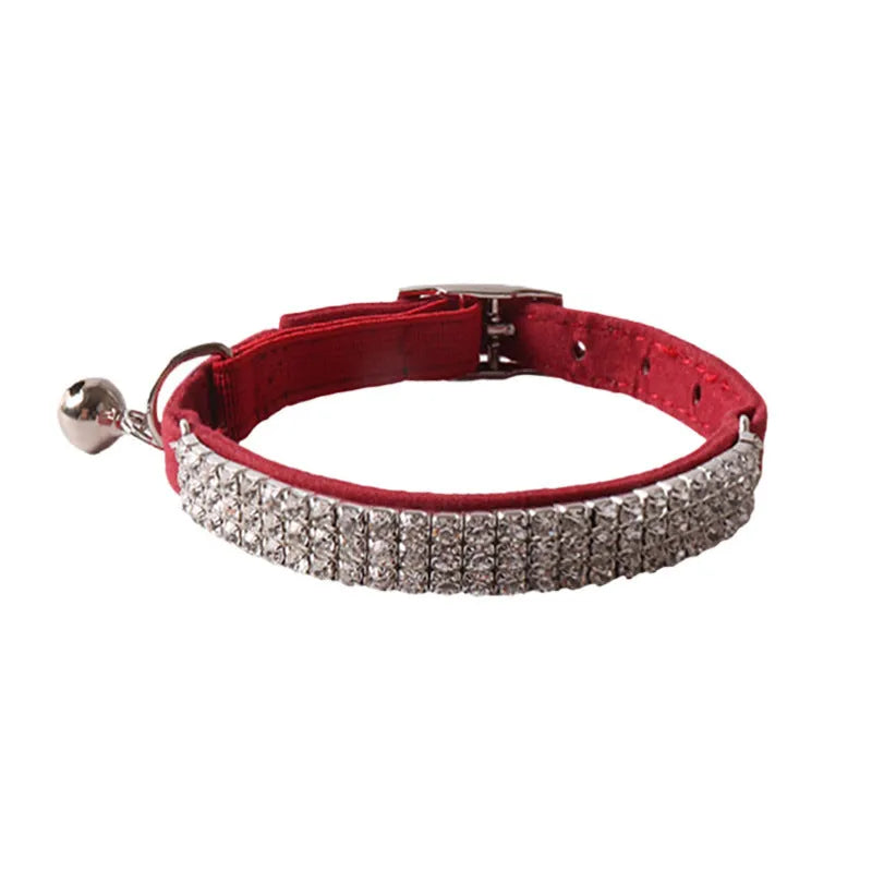 Elastic buckle cat collar with flocking material in gang drill design, shown in multiple colours.