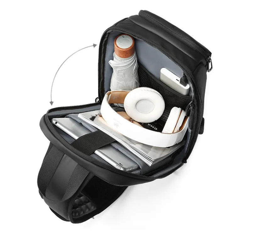 Black PVC outdoor shoulder bag with zipper, internal pockets, and an air cushion shoulder strap.