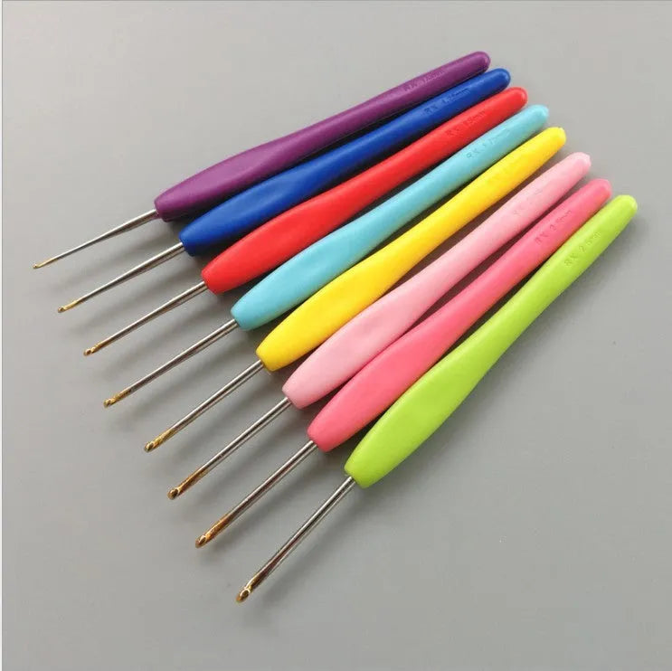 Complete set of 16 crochet hooks with soft and hard handles, sizes 1.0mm to 6.0mm, inside a grey PU storage bag.