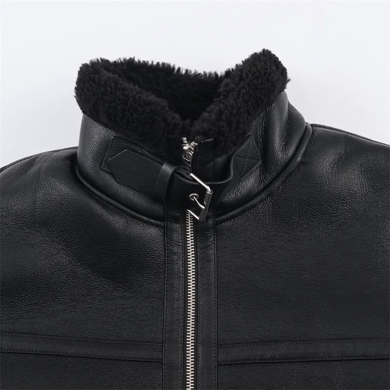 Women's black double-sided fleece jacket with PU fabric, shown front view, casual style, medium thickness.