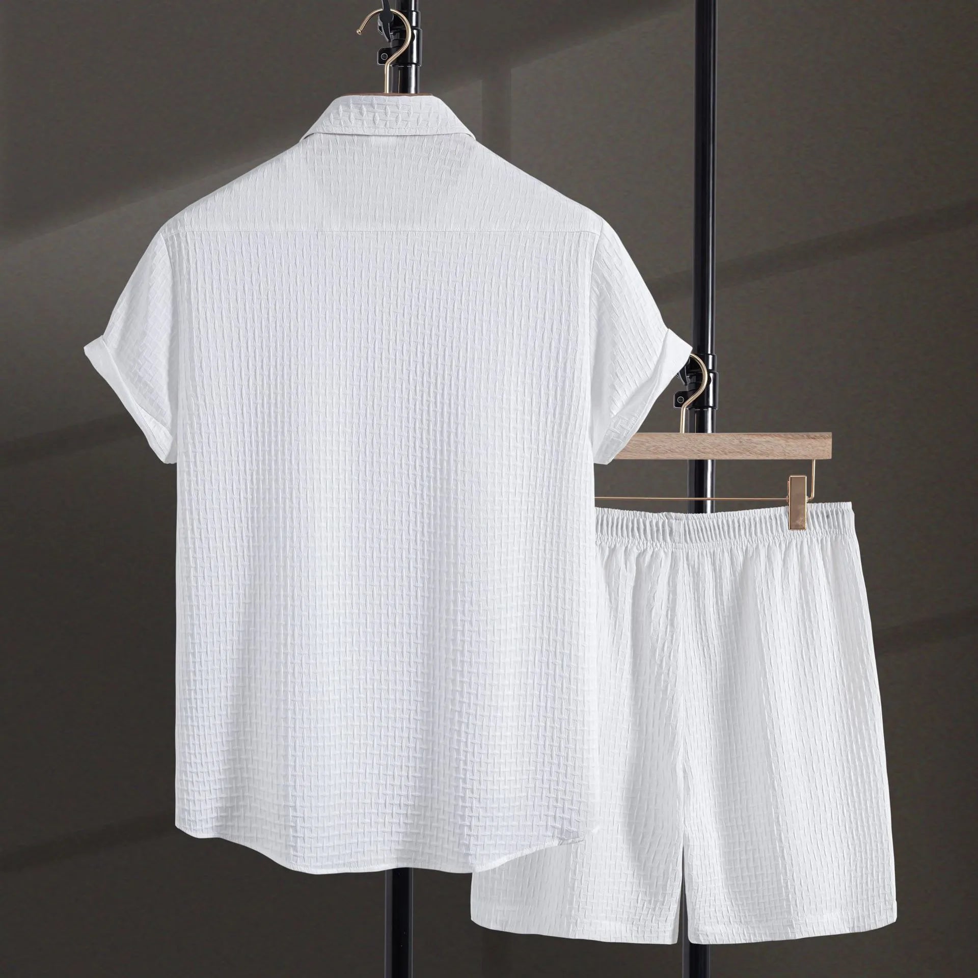 Men's loose fit cotton blend beach suit with short sleeve shirt and shorts in white.