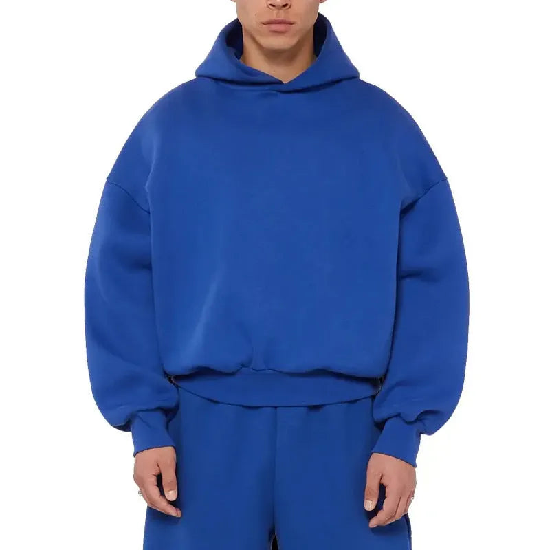 Men's grey fleece-lined cotton hoodie sweater with wool lining, showing pullover design with hood