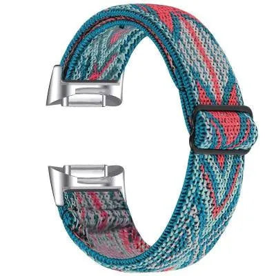 Printed elastic replacement watch strap compatible with Fitbit Charge 6, shown in an adjustable length.