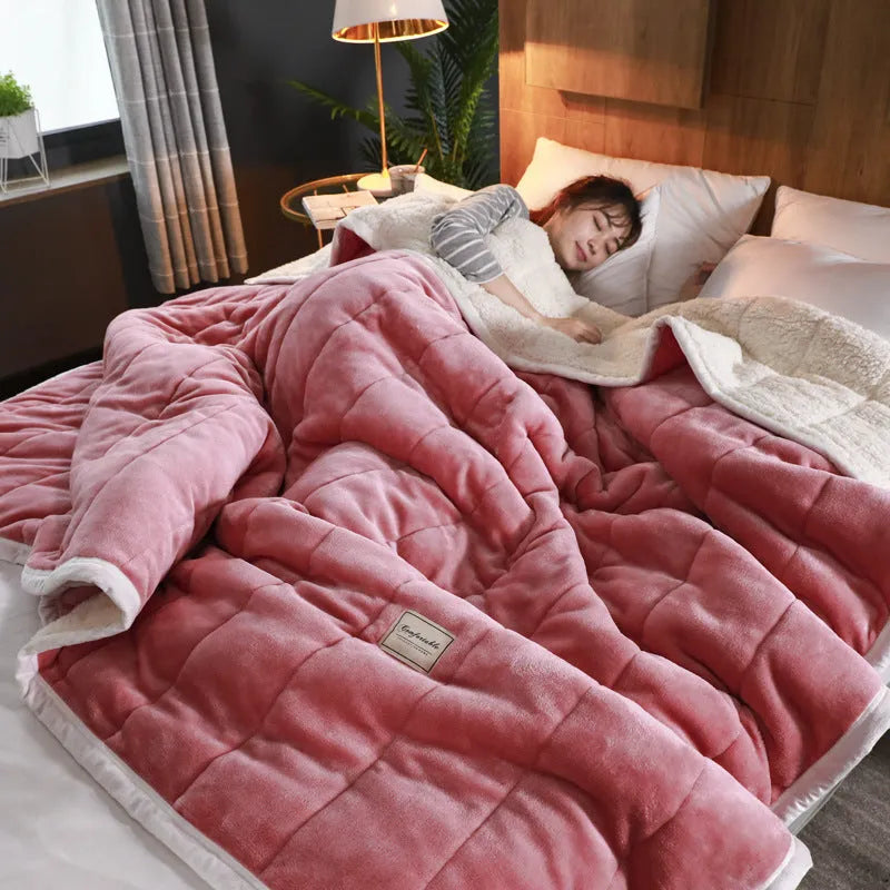 Avocado green coral fleece blanket folded to show its thick texture and 150x200cm size.