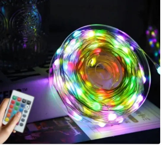 Multi colour LED animated outdoor Christmas tree lights showing 200 warm white lamps on 1.5m or 2m frame